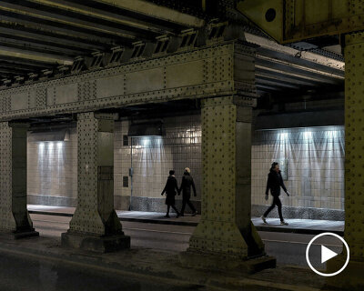 passersby activate dynamic projections in matthias oostrik's light installation in amsterdam
