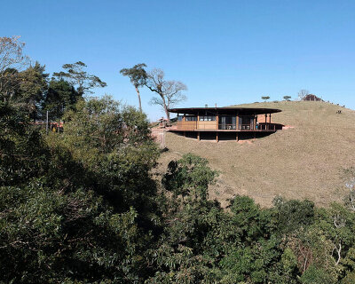 metamoorfose studio completes a round timber restaurant in rural brazil