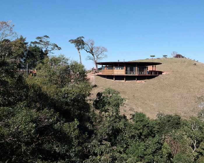 metamoorfose studio completes a round timber restaurant in rural brazil