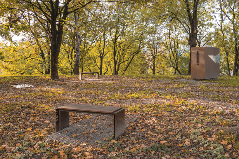 gray sandstone slabs compose NArchitekTURA's great synagogue memorial park in poland