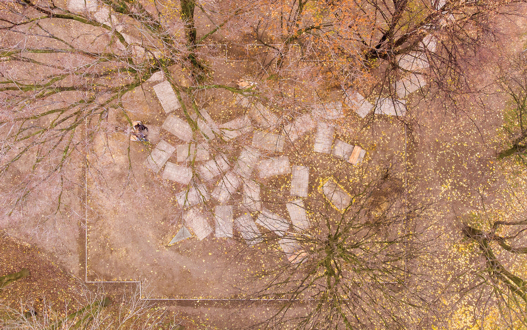 gray sandstone slabs compose NArchitekTURA's great synagogue memorial park in poland