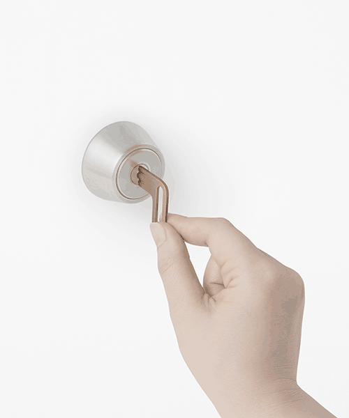 nendo's new L-shaped brass key uses the principle of leverage