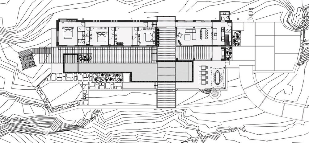 paly architects sets holiday residence on a steep rocky slope in crete, greece
