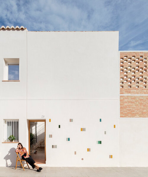 a perforated brick terrace tops this family house in valencia by piano piano studio