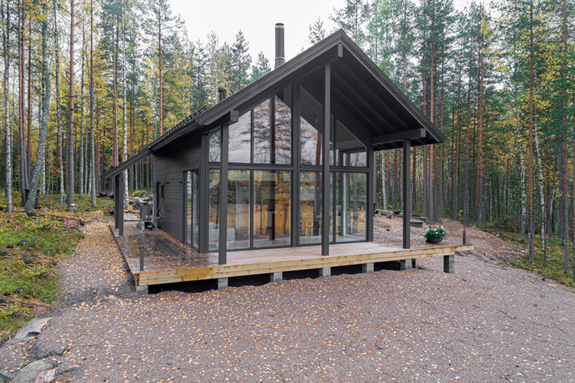 with its iniö house, pluspuu reimagines the traditional log cabin in finland