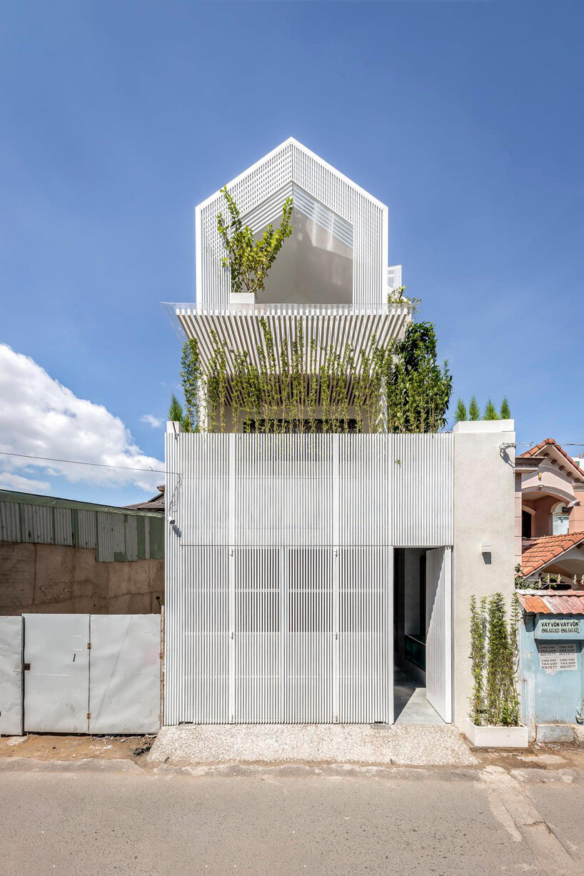 story architecture completes family residence in vietnam with interior + exterior terraces