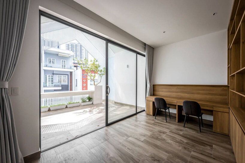 story architecture completes family residence in vietnam with interior + exterior terraces