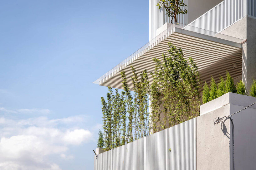 story architecture completes family residence in vietnam with interior + exterior terraces