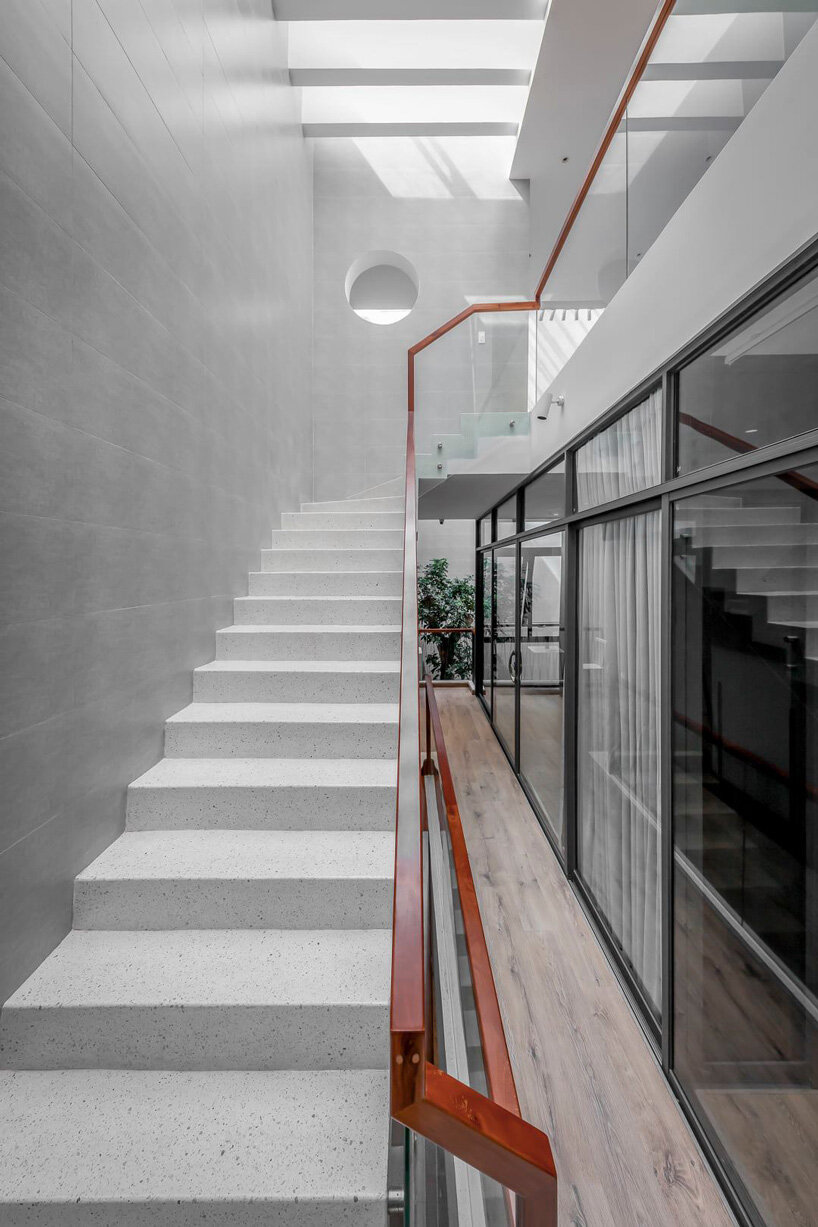 story architecture completes family residence in vietnam with interior + exterior terraces