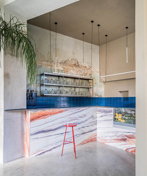 studiotamat transforms historic bakery in rome into restaurant-bar hybrid 'tre de tutto'