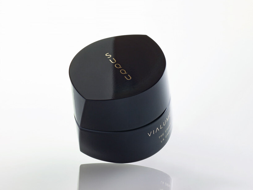 tokujin yoshioka designs sculptural deep black packaging for SUQQU's skincare collection