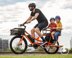 a steering wheel becomes this recycled bike's handlebar