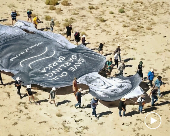JR concludes 'homily to country' with mural procession through dried landscape