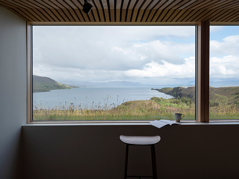 KRADS tops holiday home in iceland with green roof