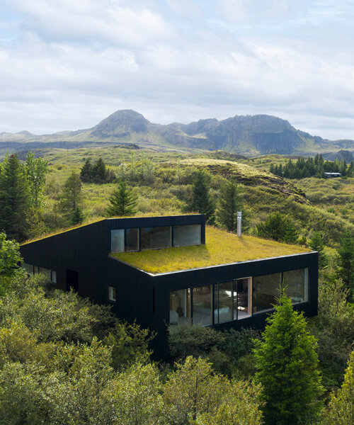 KRADS tops holiday home in iceland with green roof that blends with the landscape