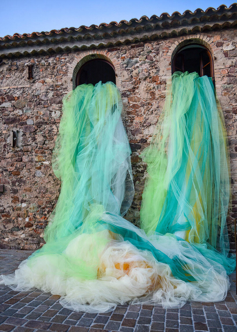 ana maría hernando's brings a french castle to life with ethereal tulle-based creations