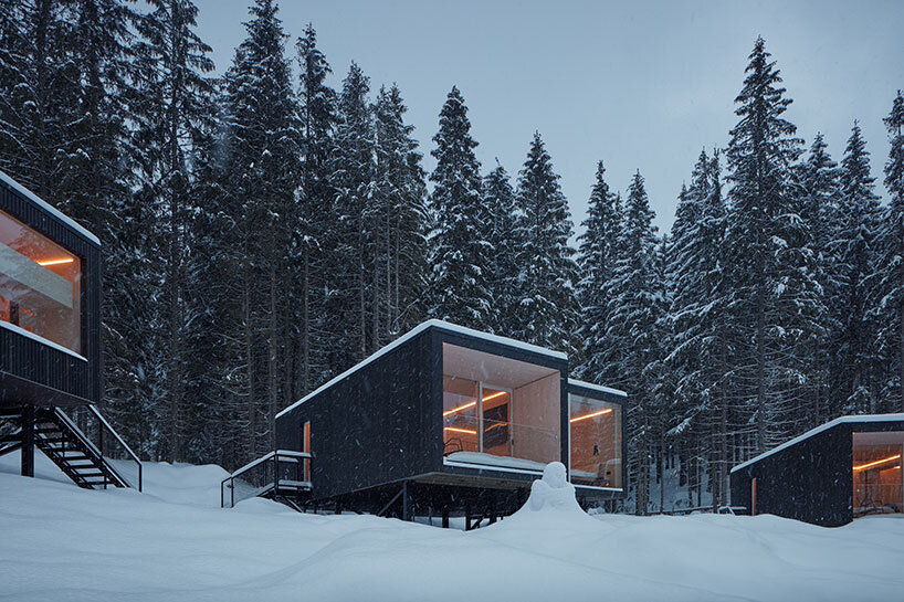 ark-shelter scatters tiny and luminous dwellings for hotel bjornson in slovakia