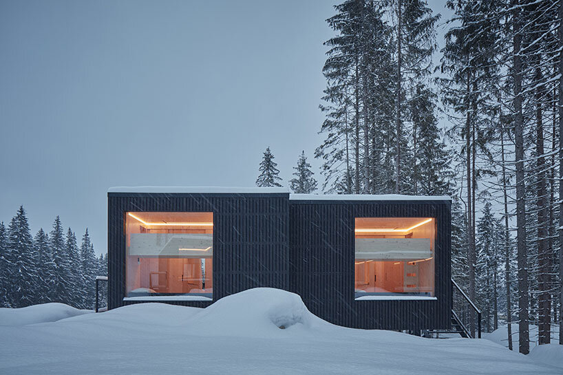 ark-shelter scatters tiny and luminous dwellings for hotel bjornson in slovakia
