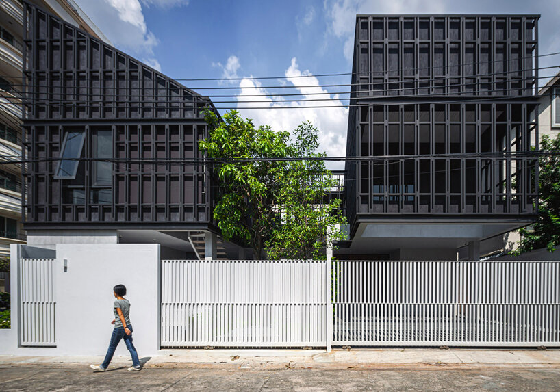 beautbureau plans a house and office around two green courtyards in bangkok