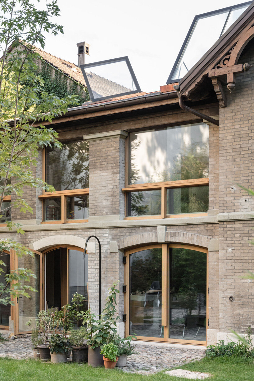 buchner bründler architekten converts basel carriage house into minimal concrete residence