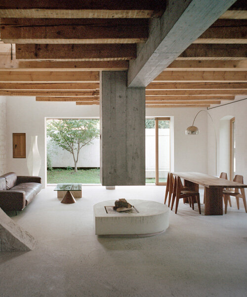 buchner bründler architekten converts basel carriage house into minimal concrete residence