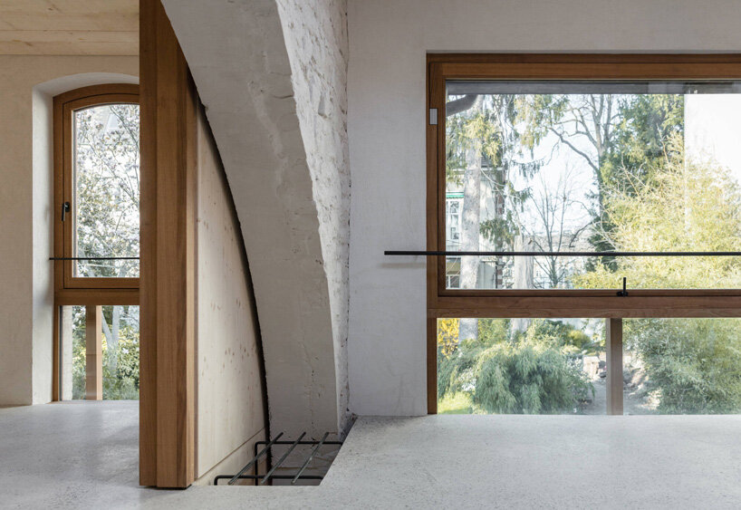 buchner bründler architekten converts basel carriage house into minimal concrete residence