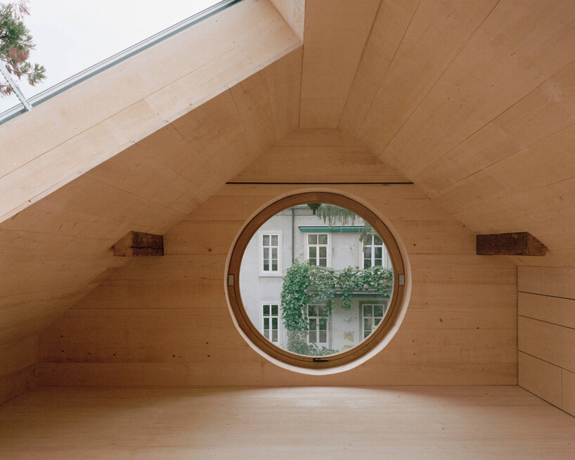 buchner bründler architekten converts basel carriage house into minimal concrete residence