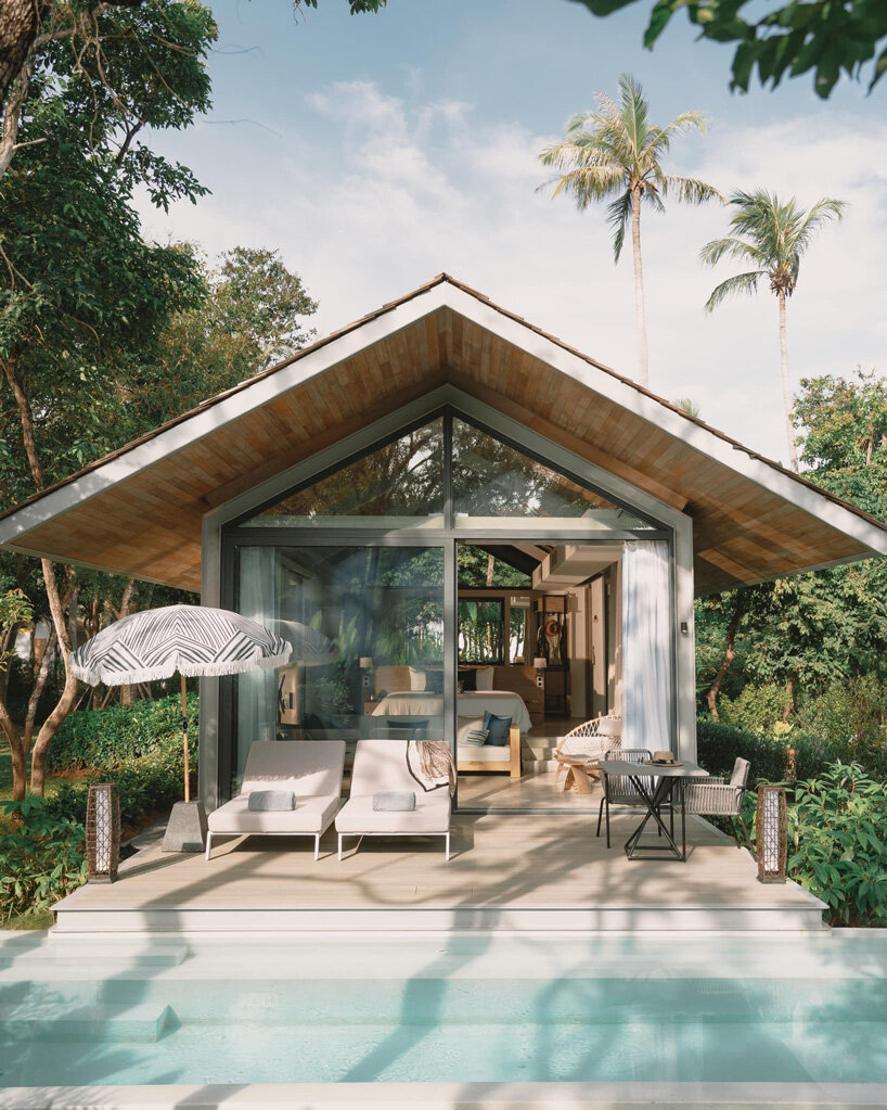 original vision blends luxury resort villas into the landscape of coconut island, thailand