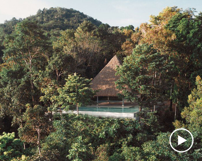 original vision blends luxury resort villas into the landscape of coconut island, thailand