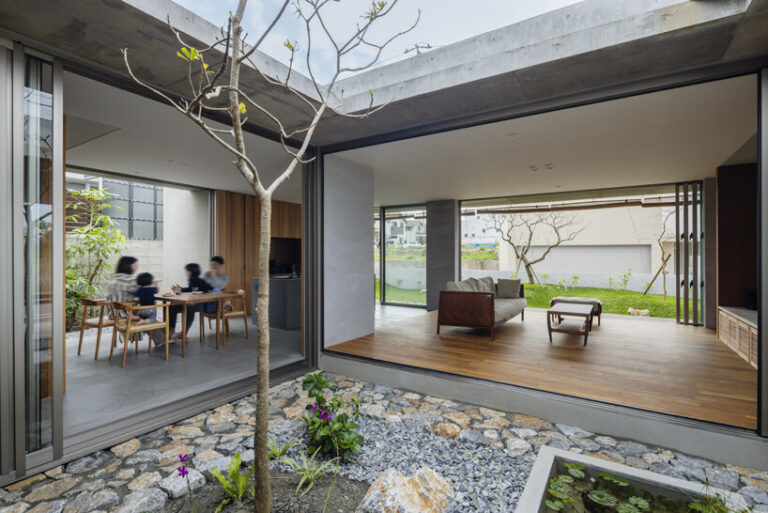 studio cochi architects develops concrete house around central open ...