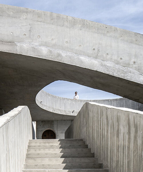 DJarquitectura sets spiral concrete structure for creative acts in university courtyard, spain