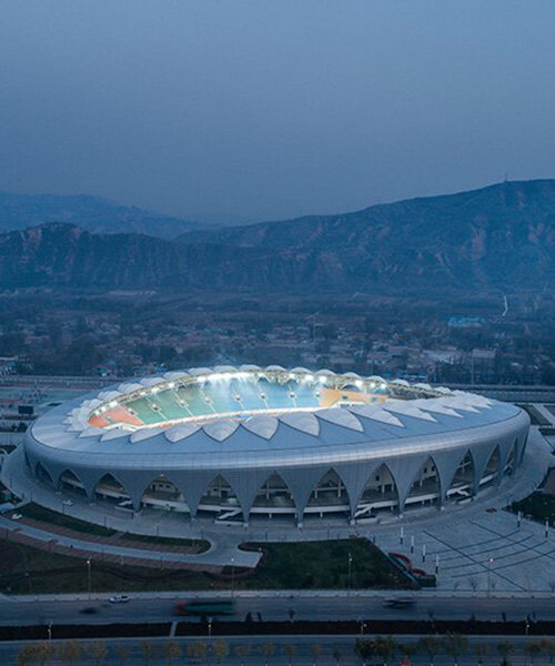 DUTS design completes oval olympic sports center stadium in linxia city, china