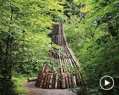 collectif exercice nestles primeval-looking wooden cabin in the french alps