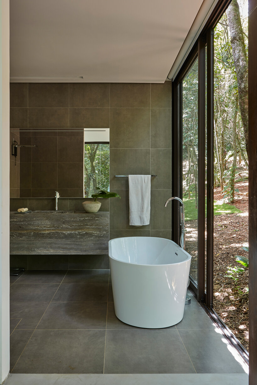 ângela roldão designs the 'glass house' for minimalist living in brazil designboom