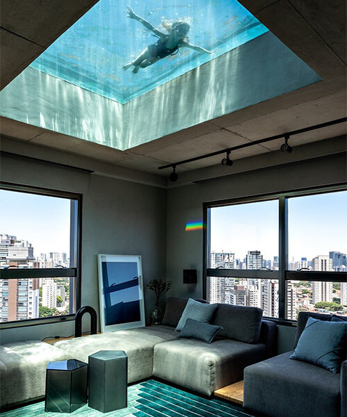 all-glass swimming pool filters sunlight within spacious penthouse renovation in brazil