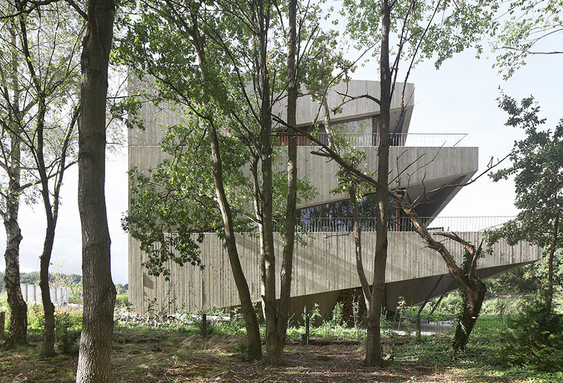 graux & baeyens architecten stacks concrete wedges to form 'house N-DP' in belgium