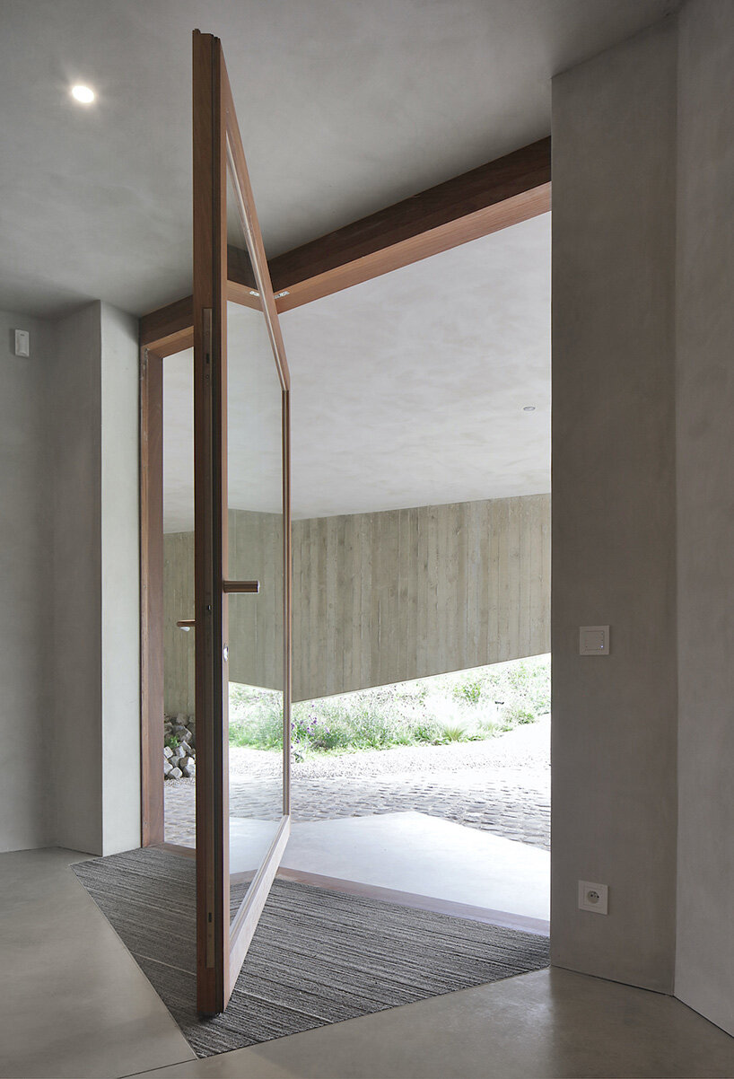 graux & baeyens architecten stacks concrete wedges to form 'house N-DP' in belgium