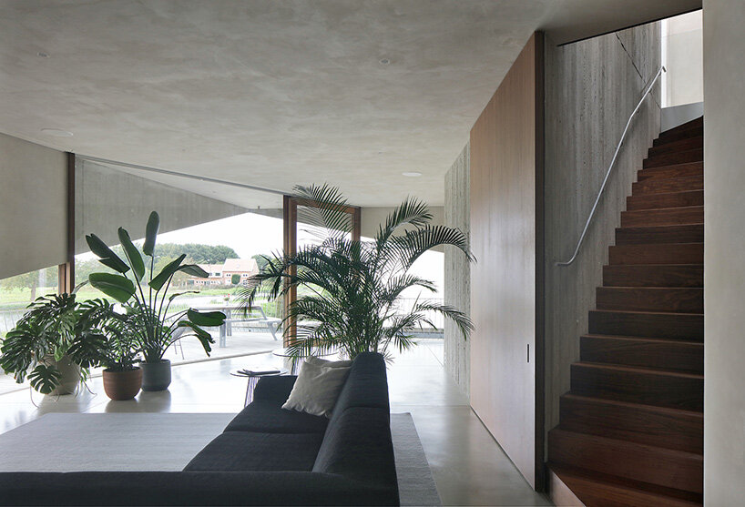 graux & baeyens architecten stacks concrete wedges to form 'house N-DP' in belgium