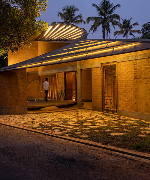 wallmakers designs its jackfruit garden residence as a twisting continuous surface