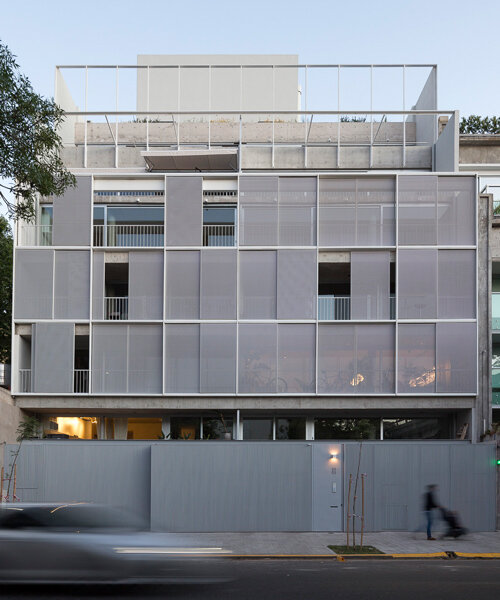 ana smud's sucre 812 apartments are wrapped in a shifting, translucent facade