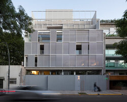 ana smud's sucre 812 apartments are wrapped in a shifting, translucent facade