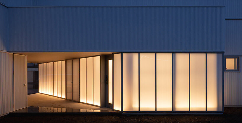 jun igarashi completes the private 'tunnel and trapezoid' house in hokkaido, japan
