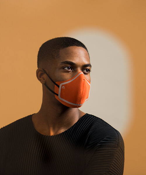 LAYER designs refillable sanitizer bottles and a layered cloth mask for wellness brand