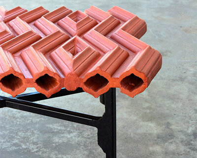 manoj patel repurposes clay roof tiles in sculptural outdoor furniture series
