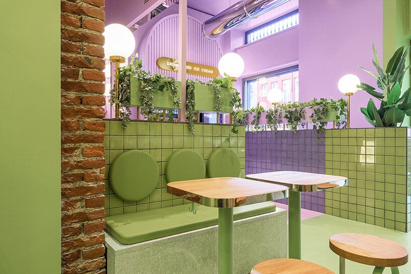 masquespacio combines brick arcs + bold colors within hamburger restaurant in milan