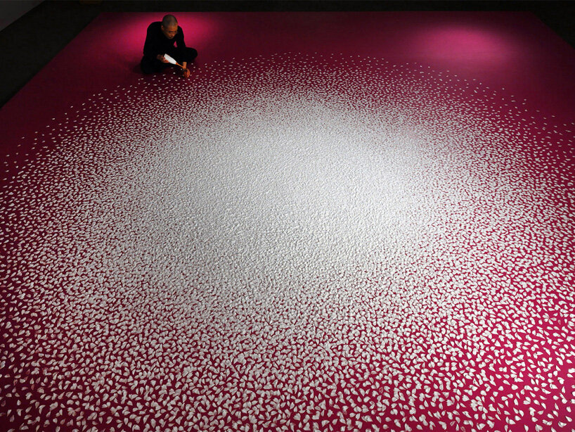 motoi yamamoto installs 100.000 salt cherry blossom petals at setouchi city art museum