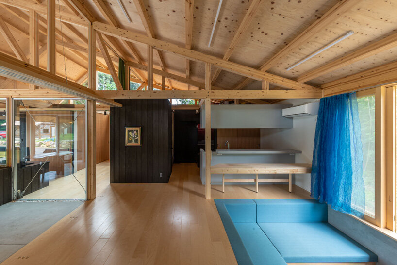 nanometer architecture wraps japanese house in charred timber cladding