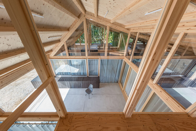 nanometer architecture wraps japanese house in charred timber cladding