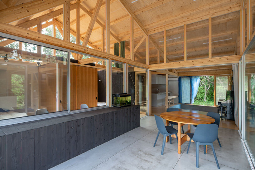 nanometer architecture wraps japanese house in charred timber cladding