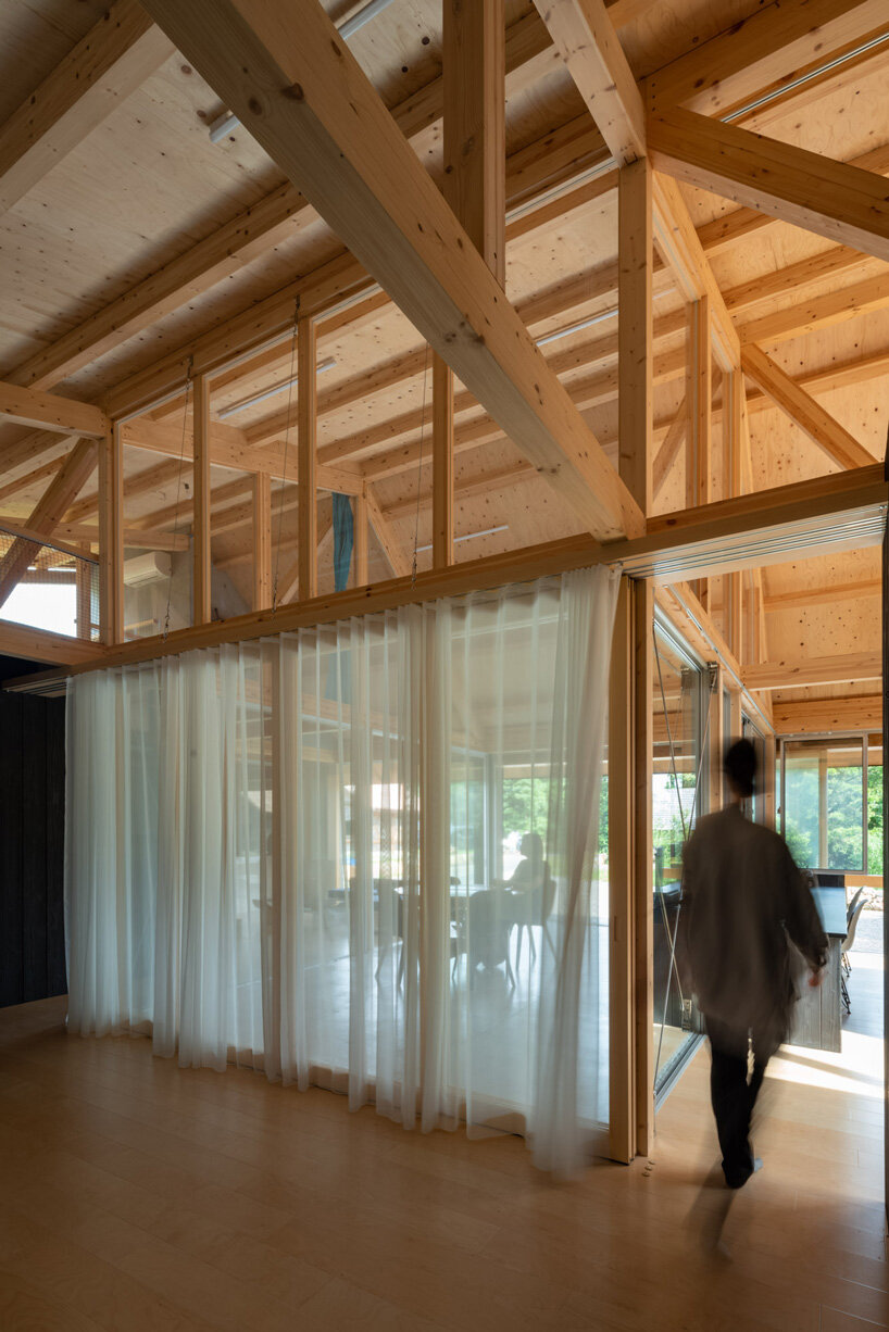 nanometer architecture wraps japanese house in charred timber cladding